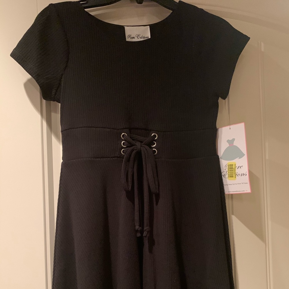 Brand new dress with tags for a little girl.